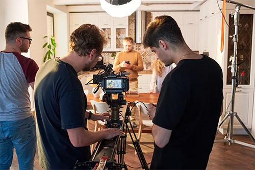 Multi-camera setup filming a TV commercial for a local business