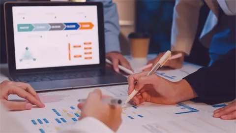 People planning a project on a computer