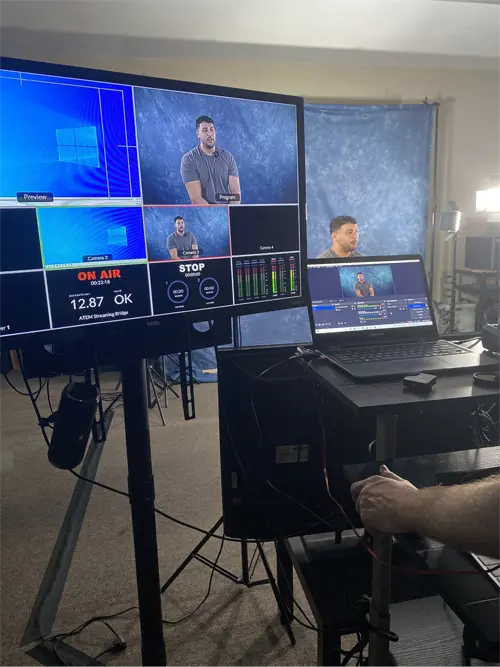 A person recording an interview in a studio