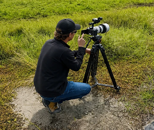 A telephoto lens eing used to capture training videos